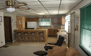 Living Room and Kitchen shot of Porcupine Lake Cottage Rental Available Year Round Up North in Gaylord, Michigan. Rent our cozy and clean cottage for the Weekend, Week, or more!